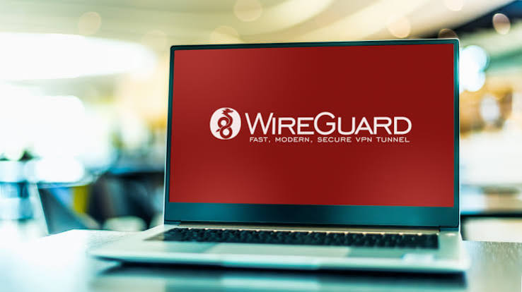 Laptop screen showing the WireGuard logo and tagline: fast, modern, secure VPN tunnel